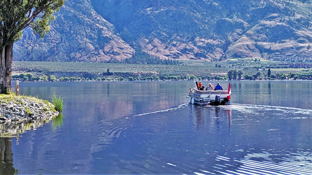 OLWQS's pontoon boat filled with volunteers, heads out to take critical water to share with the Ministry of the Environment and Climate Change.